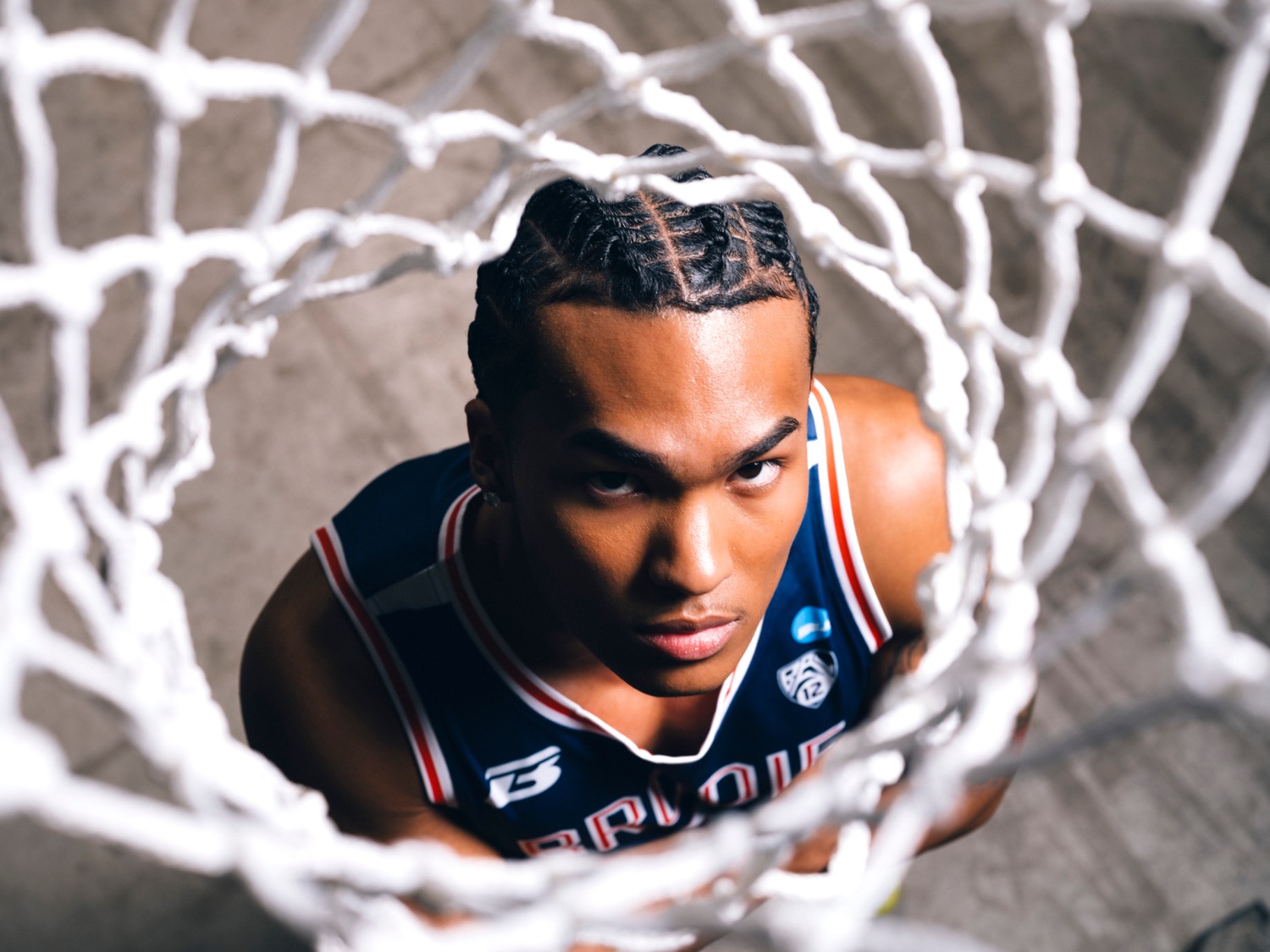 Bracket Season — athlete looking up through the net